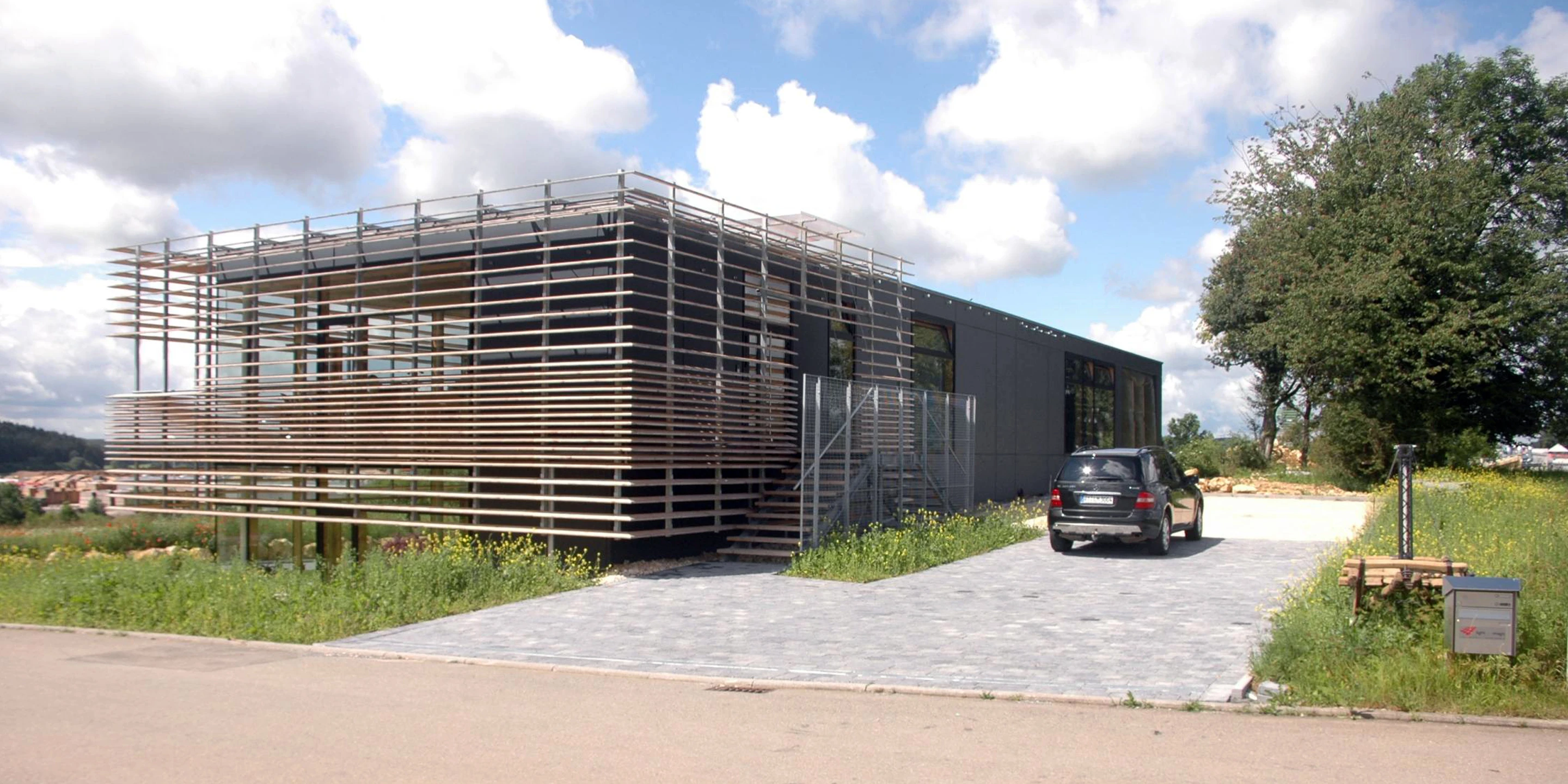 Neubau, Betontragwerk, Holztragwerk, Holzfassade, Glasfassade, Flachdach, Privat, Generalunternehmer, Büro, Verwaltung, Werkstatt,  Architektur, KTP, Kauffmann Theilig Partner, Freie Architekten PartGmbB, Stuttgart, 